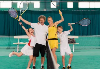 Picture of a family playing tennis