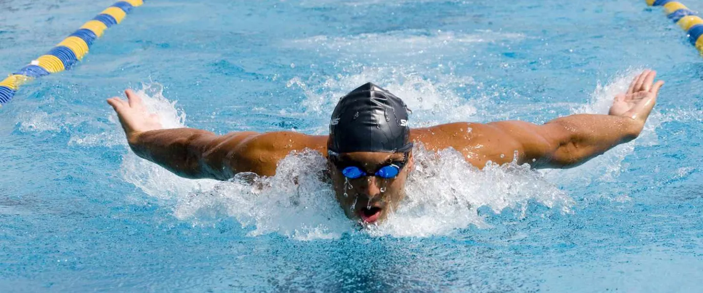 Man Swimming in pool