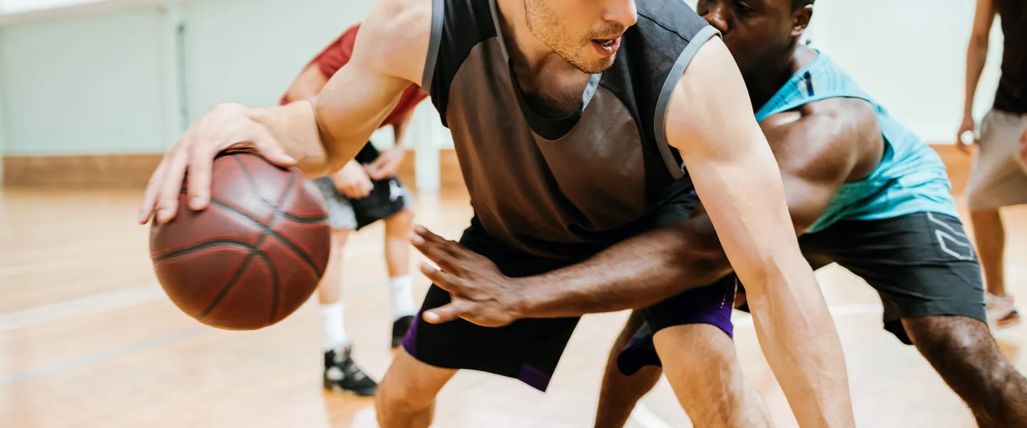 men playing basketball