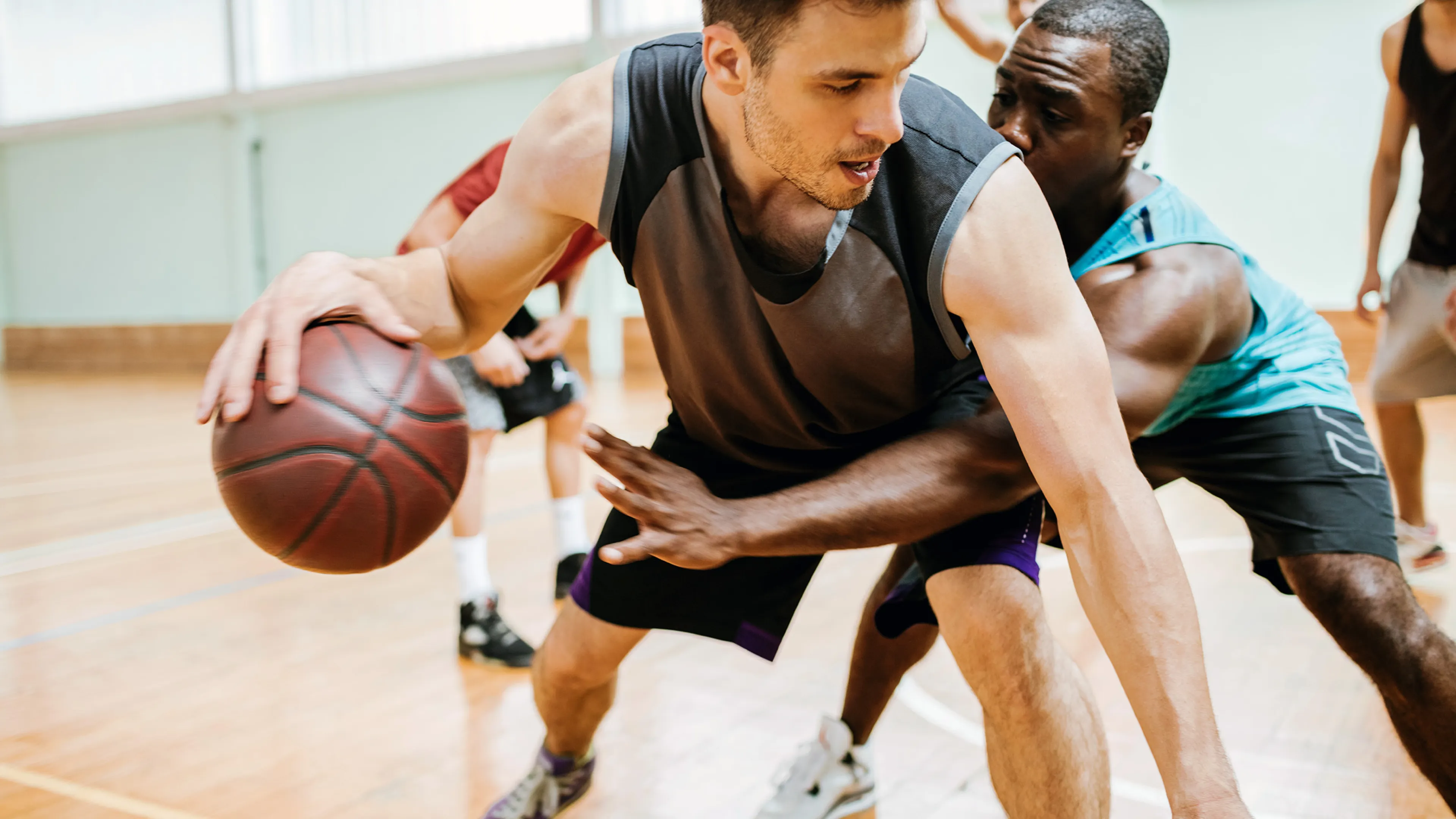 men playing basketball