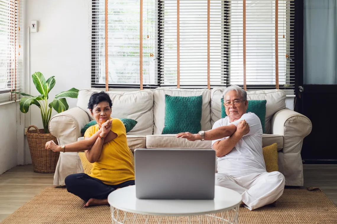 couple doing yoga virtually