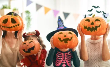 Family with pumpkins